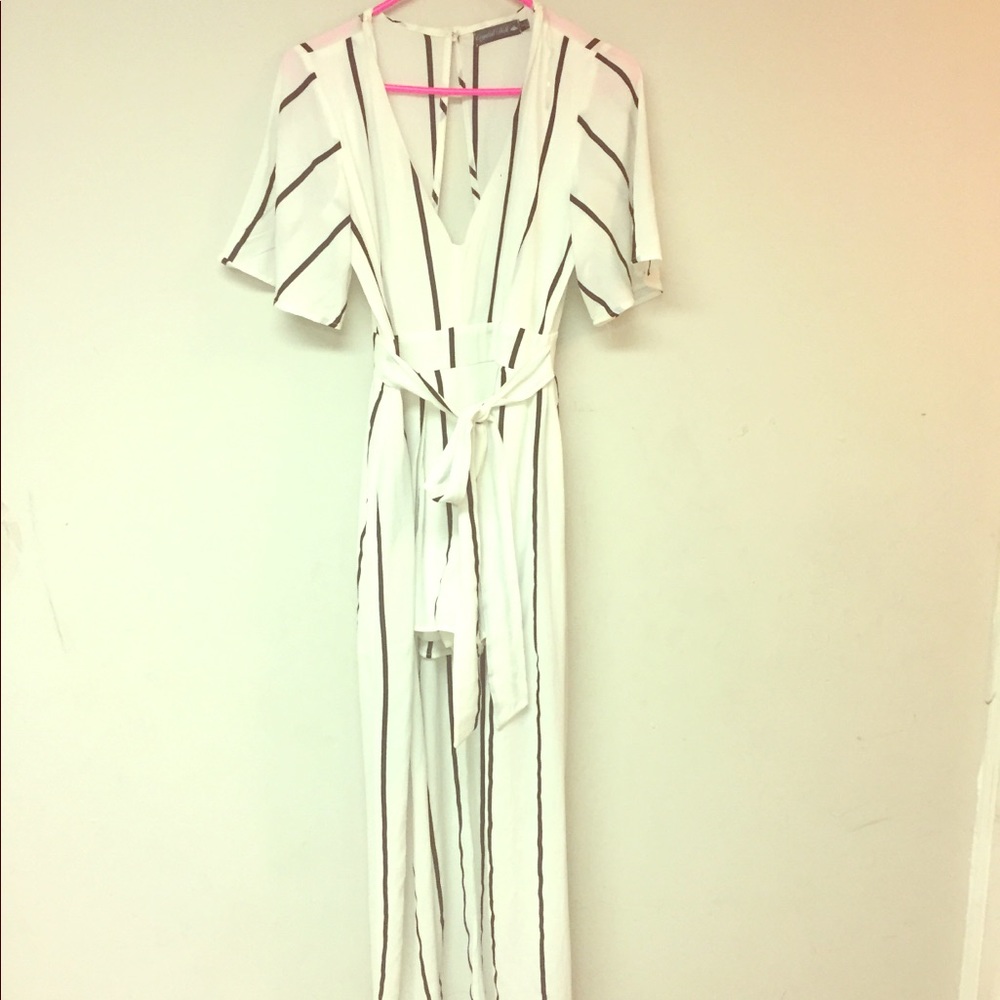Black and white high low  romper never worn